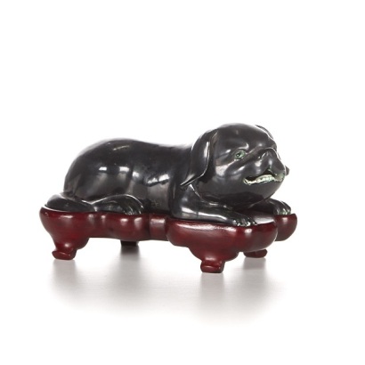 A Late-Qing Dynasty/Early Republic Period Black Glazed Dog Ornament