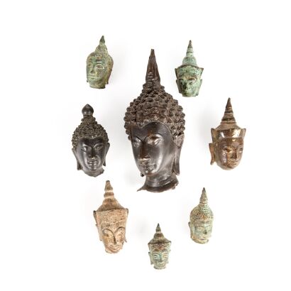 Eight Bronze Buddha Heads