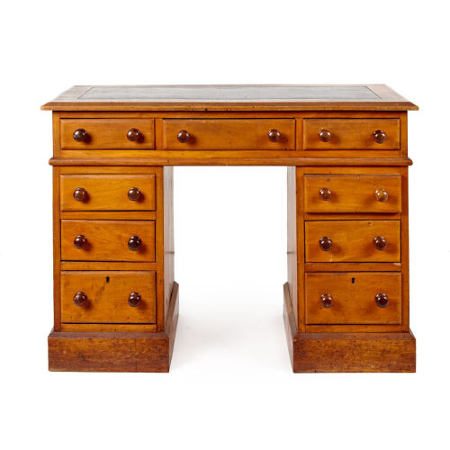 A Colonial Kauri and Rimu Pedestal Desk with Leather Inset Top