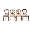 A Harlequin Set of Four Georgian Chippendale Style Chairs