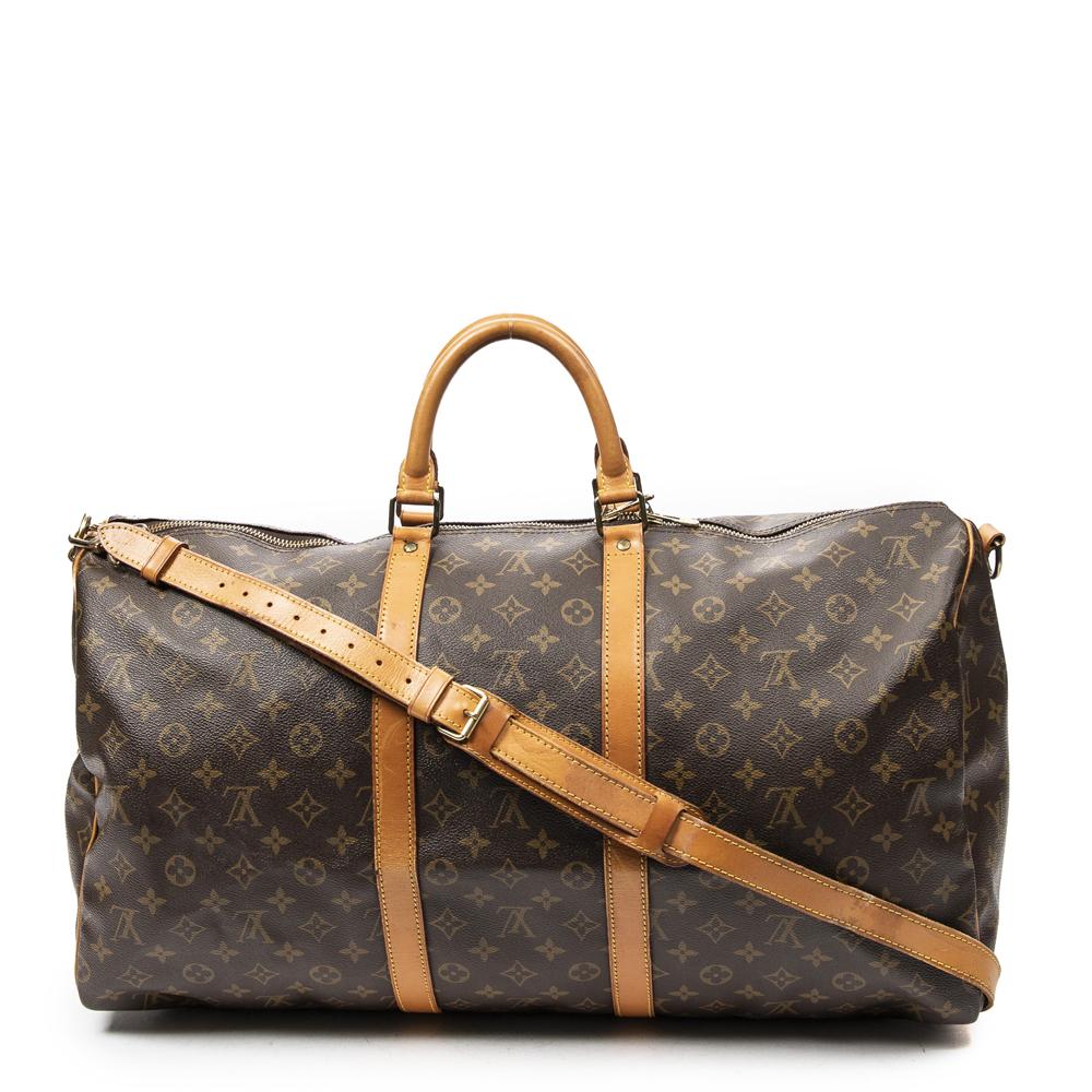 Sold at Auction: Louis Vuitton Keepall Bandouliere Bag Limited