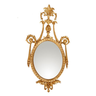 An Elaborate Carved and Gilt Girandole Mirror