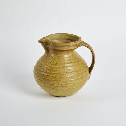 A Ribbed Vintage Ceramic Jug With Handle