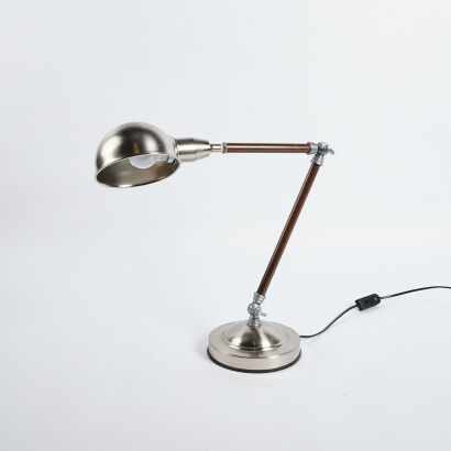 A Hinged Lamp With Heavy Metal Base