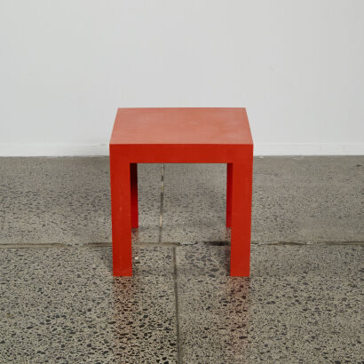 An Orange Side Table By Kartell