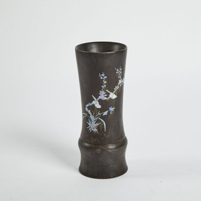 A Black Lacquer Vase With Mother Of Pearl Inlay