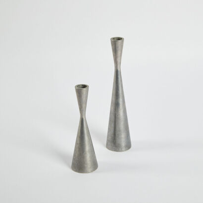 A Pair Of Aluminium Candle Holders