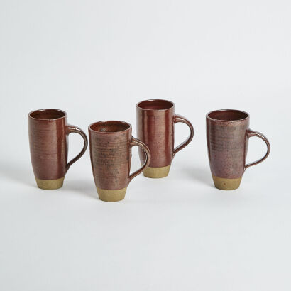 A Set Of Four Studio Pottery Coffee Mugs