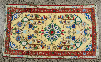 A Persian Hand-Knotted Wool Pile Rug