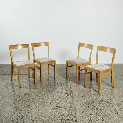 A Set of Four Modern Dining Chairs in Oak & Light Grey Fabric