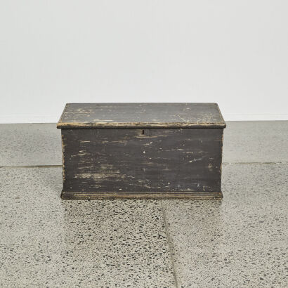 An Antique Black Wooden Chest