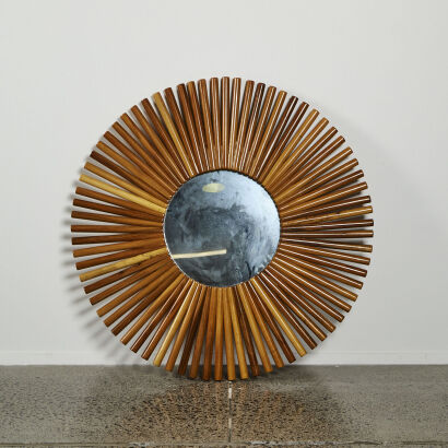 A Large Sunburst Wooden Mirror