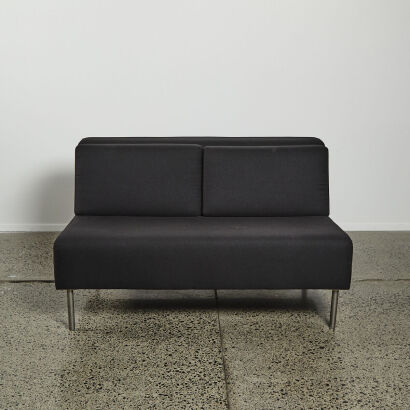 A Minimal Designer Couch in Black Upholstery