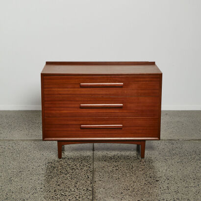 A Mid-Century Mahogany Three Drawer Unit