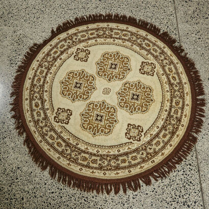 A Vintage Circular Carpet Floor Rug