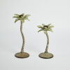 A Pair of Cast Iron Palm Tree Candlestick Holders