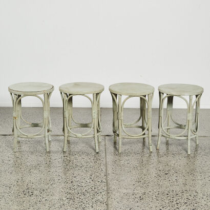 A Set Of Four Painted Cane Stools