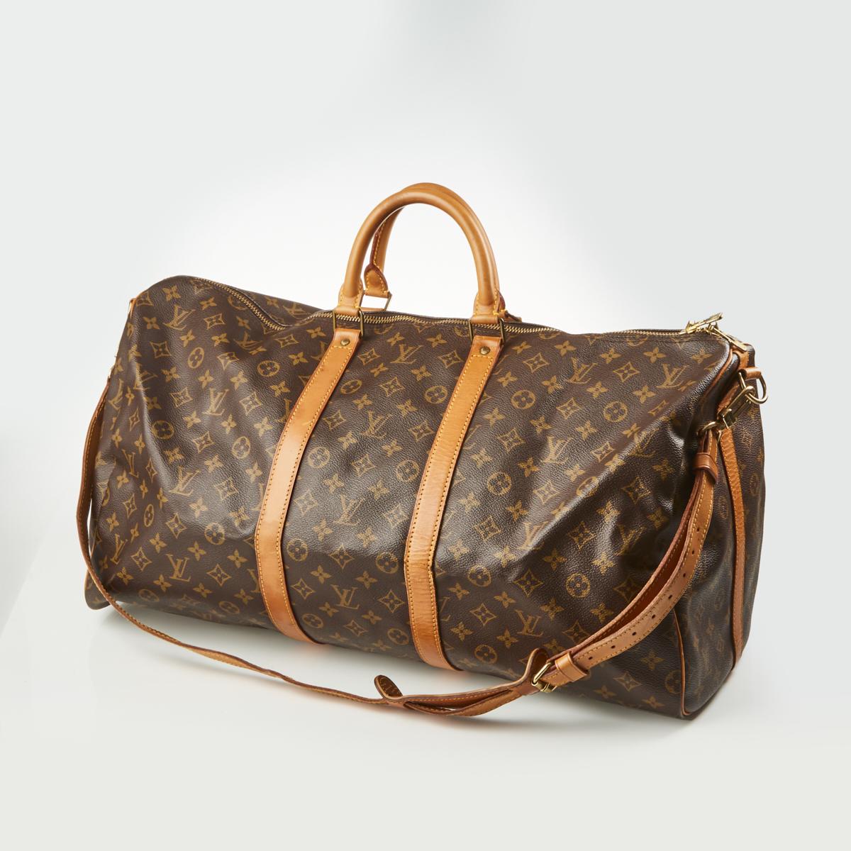 Sold at Auction: Louis Vuitton Keepall Bandouliere Bag Limited