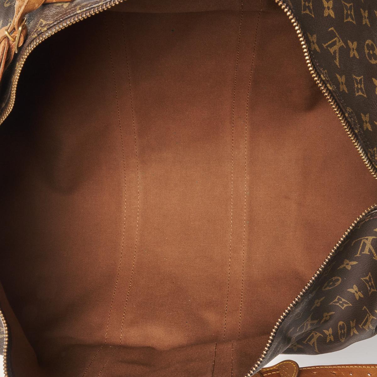 Sold at Auction: A Louis Vuitton monogram canvas suit carrier 60 with  Vachetta leather handle and trim, gold tone hardware