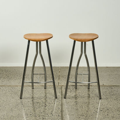 A Pair Of Stools With A Ply Top