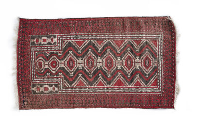 A Hand-Knotted Afghan Prayer Rug