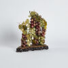 A Chinese Jade Ornament in Grape Shape
