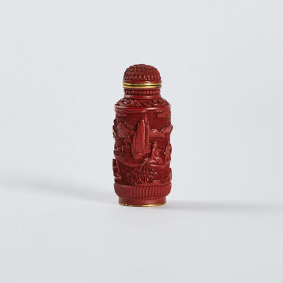 A Chinese early 20th Century cinnabar lacquer landscape and figure snuff bottle