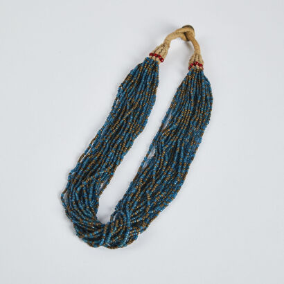 A small Asian blue glass bead necklace