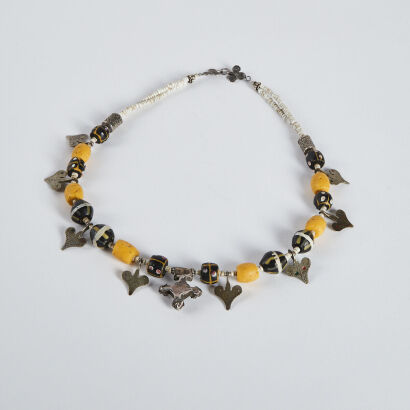 An old Asian yellow-black glass bead silver necklace