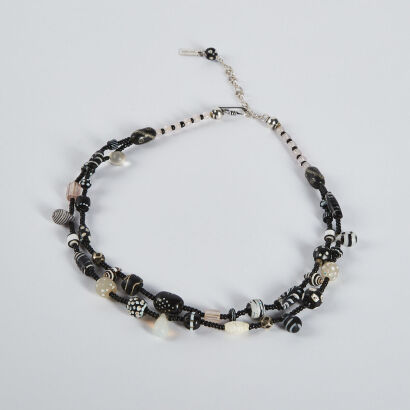 An old Asian various black glass bead necklace