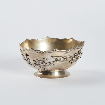 A Chinese early 19th century sterling silver bowl with flower and bird pattern