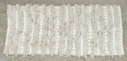 A Large Cotton Textured Floor Rug in Light Grey