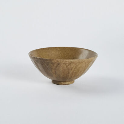 A Chinese Yuan and Ming Dynasties Longquan Kiln Bowl with Carved Lotus Pattern