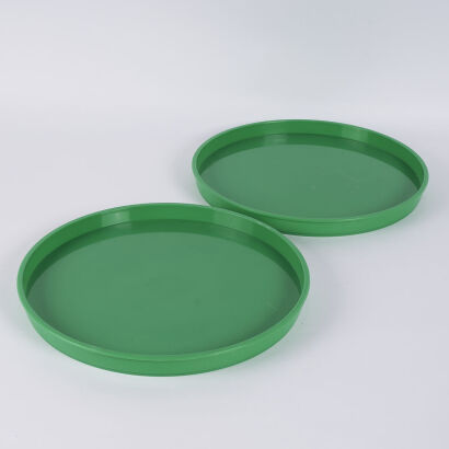 A Pair Of Vibrant Green Plastic Kartell Style Trays