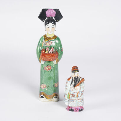 A Pair Of Asian Ceramic Figurines
