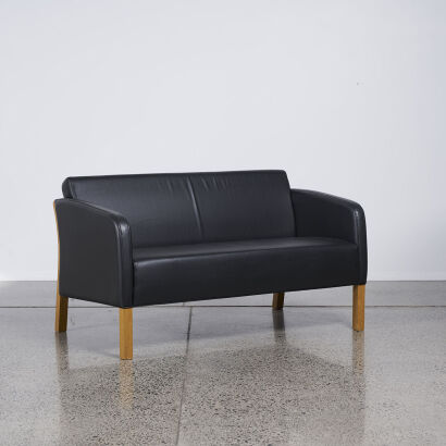 A Modern Design Two Seater Couch With Slatted Oak Frame And Black Upholstery