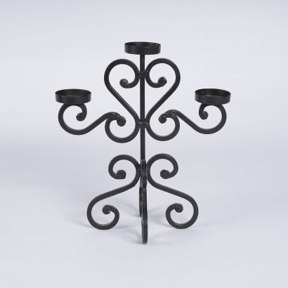 A Wrough Iron Triple Candle Holder