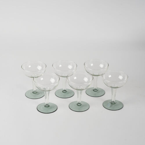 A Set Of Six Hollow Stem Champagne Coupes