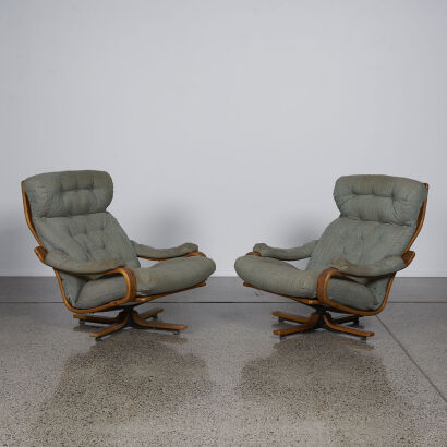 A Pair Of Bentwood Scandinavian Mid Century Lounge Chairs
