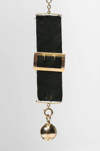 A masonic black silk memorium watch fob with folding ball cross. 9ct yellow gold. Weight 17.79 grams. Total length 15cm.
