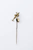 A Victorian gold miners stickpin, with pick, shovel and nugget motif with rope halter. Unmarked. Weight 2.3 grams Length 67mm. Circa 1880.