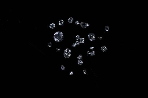 An assortment of old loose diamonds. 