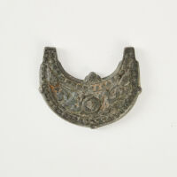 A Bronze Islamic Lunate Pendant