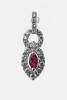 A pair of ruby and diamond stud earrings, the marquise shaped rubies within a figure of eight diamond drop setting. 18ct white gold. Weight 1.8 grams. Post and butterfly attachments.