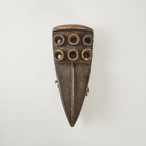 A Six Eyed Grebo Mask, Ivory Coast/Liberia