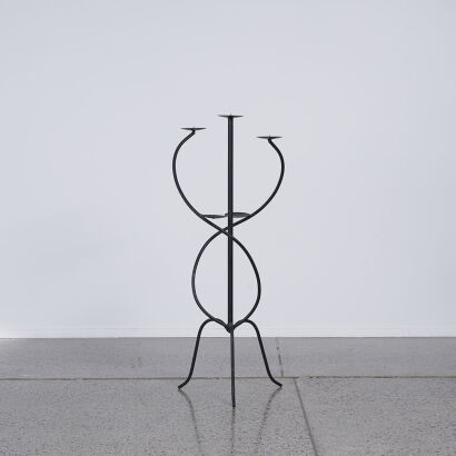 A Wrought Iron Sculptural Candelabra