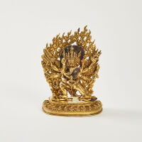 A Tibetan Gilt Bronze Figure Of Vajrakila Heruka And Dipta Chakra