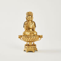 A Gilt Statue of Buddha on a Lotus Flower, China