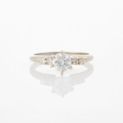 14ct White Gold, .77ct Solitaire Diamond Ring with Diamond Shoulder Accents