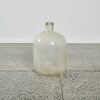 A Large Glass Carbon Bottle